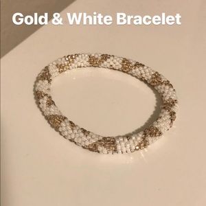 Gold and white bracelet